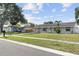 Charming one-story home with a well-maintained lawn at 9053 Hickory Cir, Tampa, FL 33615