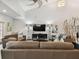 Clubhouse living room with couches, modern decor, and a large flat-screen TV at 101 Pompano Se Dr # C, St Petersburg, FL 33705