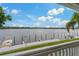 Relaxing view from the balcony overlooking docks on a calm bay with boats and picturesque horizon at 101 Pompano Se Dr # C, St Petersburg, FL 33705
