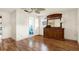 Bedroom featuring hardwood floors, ceiling fan and dresser at 10407 Oleander Dr, Port Richey, FL 34668