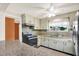 The kitchen has stainless steel appliances, plenty of counter space and nice cabinetry at 10407 Oleander Dr, Port Richey, FL 34668