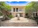 Picturesque courtyard featuring a central fountain, brick-paved ground, and inviting outdoor seating at 120 S Church Ave # 202, Tampa, FL 33609