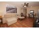 Inviting living room featuring a comfortable couch, stylish decor, and bright natural light at 120 S Church Ave # 202, Tampa, FL 33609