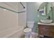Bathroom features a tub with a subway tile surround, a vessel sink and updated fixtures at 12372 113Th St, Largo, FL 33778