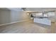 Open kitchen area with tile floors, stainless appliances, and an island at 12372 113Th St, Largo, FL 33778