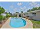 A private swimming pool with well-maintained outdoor space is in the backyard at 12372 113Th St, Largo, FL 33778