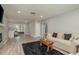 Cozy living room with modern flooring, and neutral decor at 1281 Robin Hood Ln, Dunedin, FL 34698
