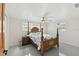 Bright bedroom featuring a ceiling fan, natural light, and ample space at 13323 Susan Dr, Hudson, FL 34667