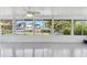 Enclosed lanai overlooking waterfront and backyard at 13323 Susan Dr, Hudson, FL 34667