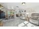 Bright and open living area with a view into kitchen and dining area at 13323 Susan Dr, Hudson, FL 34667