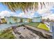 View of a back patio area on the canal at 13929 Muriel Ave, Hudson, FL 34667
