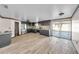 Spacious eat-in kitchen with stainless steel appliances and a breakfast bar at 13929 Muriel Ave, Hudson, FL 34667