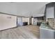 Open kitchen layout with updated appliances and eat-in area at 13929 Muriel Ave, Hudson, FL 34667