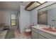 Bathroom with a walk-in shower, vanity, and toilet at 14449 Wadsworth Dr, Odessa, FL 33556