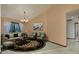 Cozy living room featuring neutral walls, a chandelier, and comfortable seating at 14449 Wadsworth Dr, Odessa, FL 33556