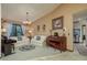 Comfortable living room with plush white sofas, piano, and decor at 14449 Wadsworth Dr, Odessa, FL 33556