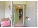 The foyer reveals a well-lit entryway with open door and tiled flooring at 1609 Pebble Beach N Blvd, Sun City Center, FL 33573