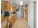 Spacious kitchen featuring ample storage and light-colored cabinetry at 1609 Pebble Beach N Blvd, Sun City Center, FL 33573