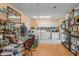 Functional utility room with laundry area and storage cabinets for organization at 1609 Pebble Beach N Blvd, Sun City Center, FL 33573