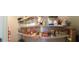 Well-organized pantry with wire shelving provides ample storage space for food and household items at 16728 Kingman Reef St, Wimauma, FL 33598
