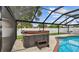 View of the outdoor hot tub situated next to the refreshing pool area at 1675 Eden Ct, Clearwater, FL 33756