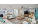 Spacious living area with plush seating, wood accents, and a comfortable layout at 1675 Eden Ct, Clearwater, FL 33756