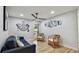 Bright living room with wood floors, comfortable seating, and stylish nautical decor at 1675 Eden Ct, Clearwater, FL 33756