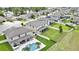 Overhead view of a backyard with an extended lawn, surrounded by serene landscaping at 1821 Cherry Walk Rd, Lutz, FL 33558