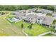 Spacious backyard with lush green lawn, and a pool, perfect for outdoor gatherings and relaxation at 1821 Cherry Walk Rd, Lutz, FL 33558