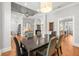 Spacious dining room with hardwood floors, stylish lighting, and easy access to living areas at 204 S Trask St, Tampa, FL 33609