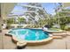 Sparkling pool and spa area surrounded by lush landscaping, creating a private backyard oasis at 204 S Trask St, Tampa, FL 33609