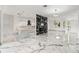 Open-concept living room featuring marble floors and a modern fireplace at 2238 Shirecrest Cove Way, Lutz, FL 33558