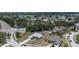 Aerial view of neighborhood, showing the property, lakes and nearby roadways at 22755 Cypress Trail Dr, Lutz, FL 33549