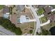 This aerial shows the property's layout including the pool, fenced backyard, nearby streets, and surrounding neighborhood at 22755 Cypress Trail Dr, Lutz, FL 33549