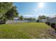 Spacious fenced backyard providing plenty of room for outdoor activities at 22755 Cypress Trail Dr, Lutz, FL 33549