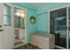 View from the lanai into the bathroom showcasing the vanity with sink and mirror at 22755 Cypress Trail Dr, Lutz, FL 33549