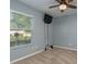 Comfortable bedroom with a ceiling fan, natural light, and a neutral color scheme for a relaxing atmosphere at 22755 Cypress Trail Dr, Lutz, FL 33549