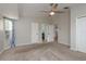 Large bedroom offering ample space, neutral walls, and a ceiling fan, perfect for relaxation at 22755 Cypress Trail Dr, Lutz, FL 33549