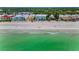Beautiful beachfront condos nestled along a pristine shoreline with turquoise water at 24 Gulf Blvd # 1C, Indian Rocks Beach, FL 33785