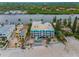 Aerial view of condo building showing proximity to the beach at 24 Gulf Blvd # 1C, Indian Rocks Beach, FL 33785