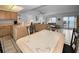 The dining area provides ocean views and is part of an open-concept design at 24 Gulf Blvd # 1C, Indian Rocks Beach, FL 33785
