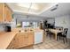 Open-concept kitchen area offering seamless transition to dining room and living room at 24 Gulf Blvd # 1C, Indian Rocks Beach, FL 33785