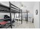 Unique loft bed design with functional desk space beneath, ideal for study or creative pursuits at 2408 Wishing Well Way, Tampa, FL 33619