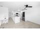 Modern kitchen featuring stainless steel appliances and a stylish island at 2408 Wishing Well Way, Tampa, FL 33619