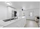Contemporary kitchen with a stainless steel refrigerator and island at 2408 Wishing Well Way, Tampa, FL 33619