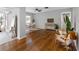 Bright living room featuring hardwood floors, modern decor, and ample natural light at 2432 Keene Park Dr, Largo, FL 33771