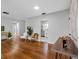 Hardwood flooring throughout open living area with abundant light and modern decor at 2432 Keene Park Dr, Largo, FL 33771