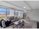 Comfortable sunroom area with large windows offering plenty of natural light at 2432 Keene Park Dr, Largo, FL 33771
