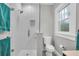 Modern bathroom with a glass-enclosed shower, white subway tile, and patterned floor tile at 2439 6Th N Ave, St Petersburg, FL 33713
