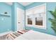 Light blue bedroom featuring large windows and modern trim at 2439 6Th N Ave, St Petersburg, FL 33713